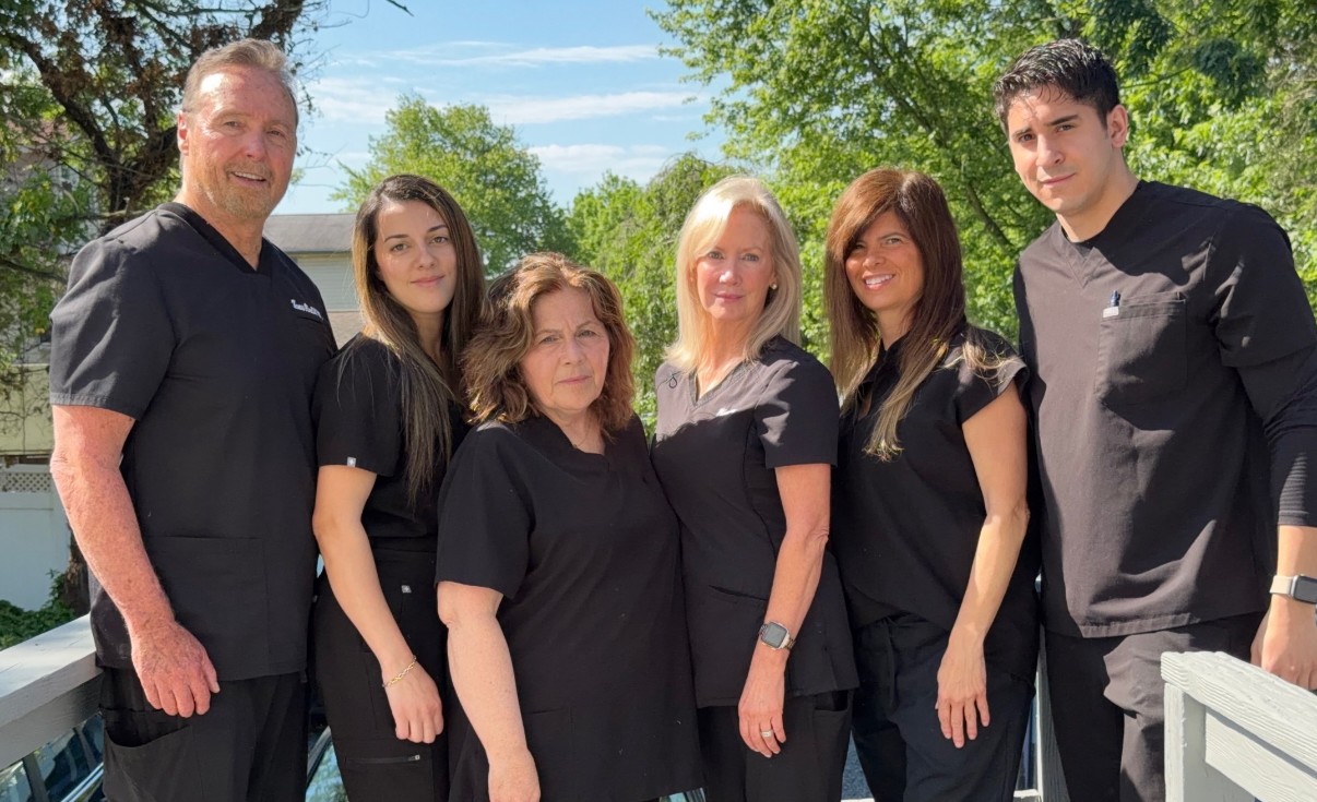 Dr. Tom Oliver and the Oliver Wellness Center team outside the Moorestown clinic
